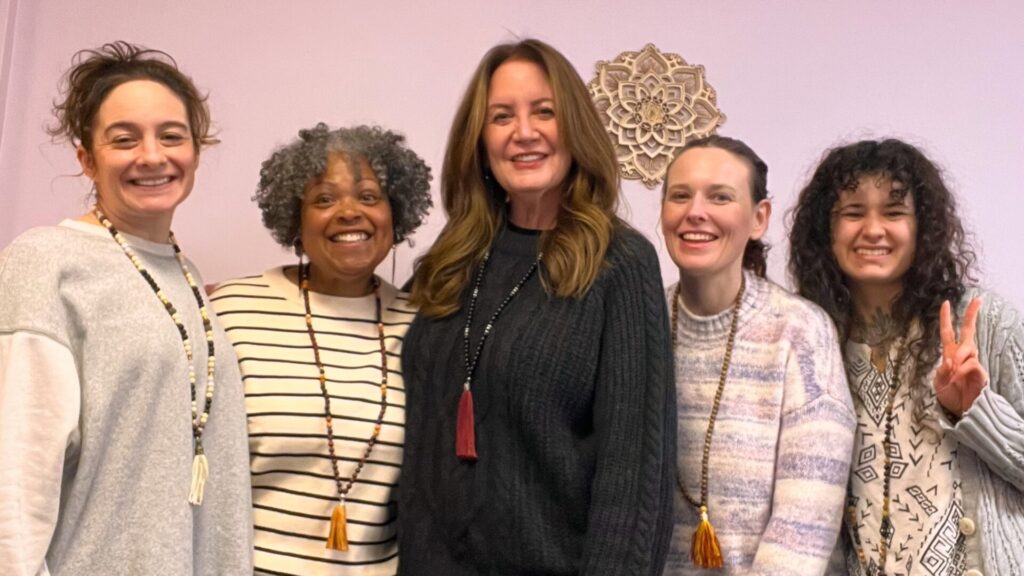 a group photo of our last Mala Necklace Making Workshop with Ebonique Patience