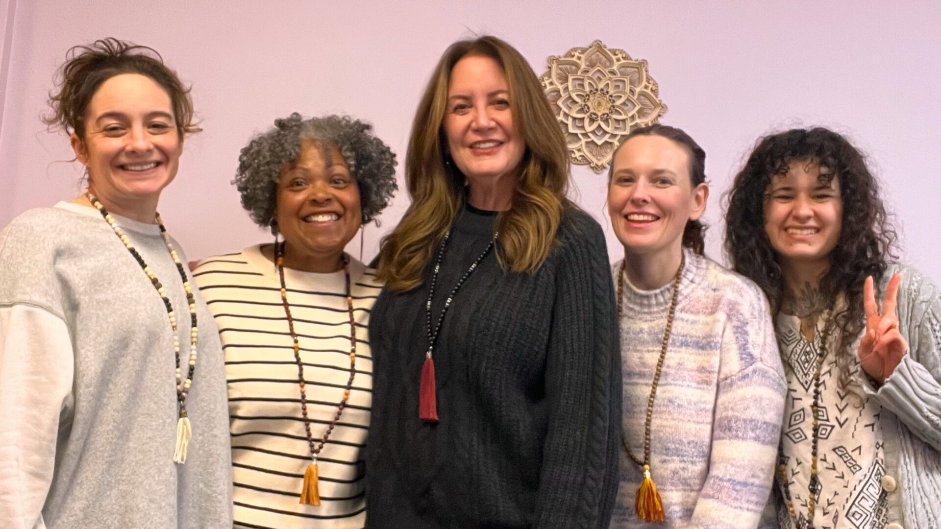a group photo of our last Mala Necklace Making Workshop with Ebonique Patience